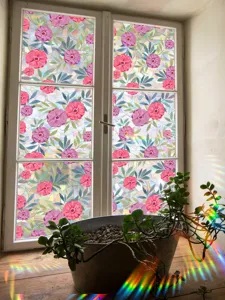 Decorative static window film featuring colorful floral prism pattern for rainbow light.