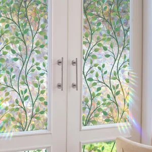 Decorative static window film with vibrant green vine pattern and stunning rainbow prism sun catcher.