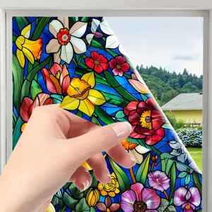 Stained glass window film detail showing colorful floral privacy static cling sticker design.