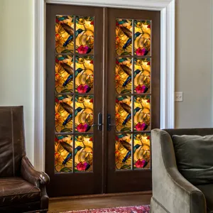 Stained glass window film featuring colorful hummingbird and floral patterns for privacy.