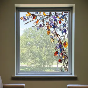 Decorative stained glass window film with tree branch and colorful leaves pattern for privacy.