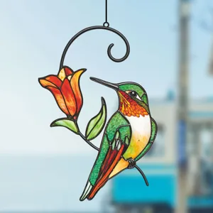 Stunning stained glass hummingbird window hanging detail showing vibrant colors and metal craft.