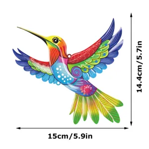 Colorful metal hummingbird wall art detail showing vibrant hand-painted surface patterns