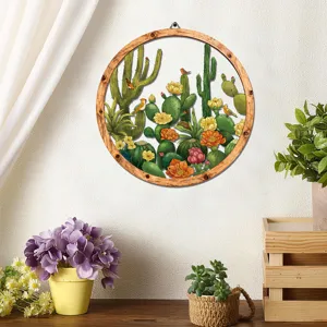 Round wooden metal wall art hanging with beautiful cactus and flower botanical design for home decor.