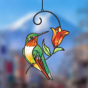Detailed view of the stained glass metal hummingbird wall hanging ornament with vibrant colors.