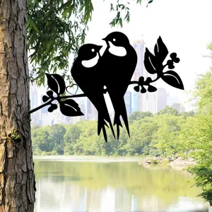 Metal silhouette garden stake featuring two lovely birds on tree branch, outdoor decor.