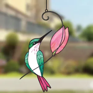 Stained glass hummingbird suncatcher detail, colorful metal hanging window art decoration.