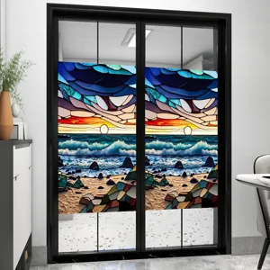 Stained glass window film detail showing vibrant sunset beach design applied on glass door.