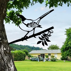 Black metal garden bird silhouette stake for outdoor yard decoration, durable metal art.
