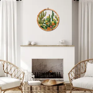 Round wooden wall hanging featuring botanical cactus and flower illustration for home decor detail