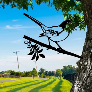Metal bird tree insert detail, black silhouette garden art decoration for outdoor yard.