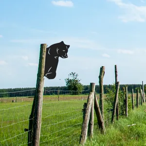 Black metal cougar silhouette garden stake, outdoor iron art animal fence decor for yard.