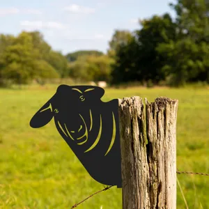 Metal sheep silhouette garden stake, outdoor yard art decor peeking fence decoration.