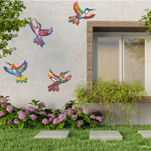 Detailed view of colorful metal hummingbird wall decor for outdoor garden, fence and home decoration.