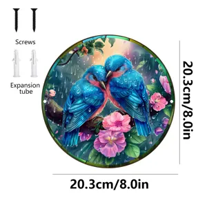 Vista detallada de la placa colgante decorativa de metal redondo con pájaros azules, 20,3cm.