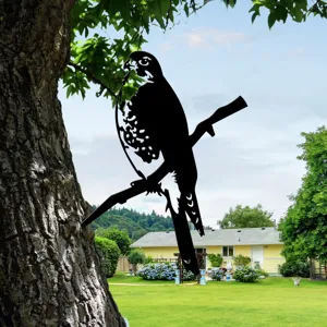 Metal bird silhouette garden stake, outdoor tree art decoration for yard and lawn decor.