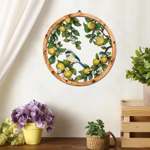 Wooden metal round wall hanging decor with lemon bird design for home room interior aesthetic.