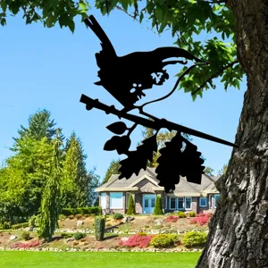 Black metal bird tree silhouette garden stake outdoor yard decoration metal art ornament detail.