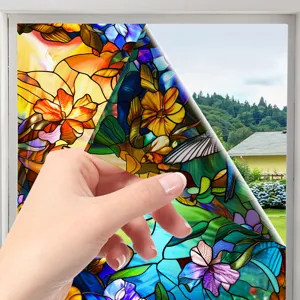 Stained glass window film detail showing colorful floral pattern and easy peel electrostatic design.