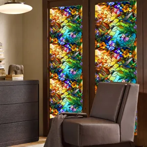 Stained glass window film with colorful floral and hummingbird design for privacy and sun protection.