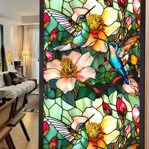 Stained glass window film featuring vibrant hummingbirds and floral patterns for home decor.
