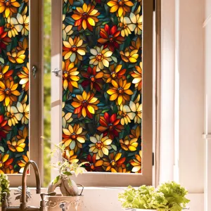 Stained glass floral window film detail showing vibrant colored flower pattern on glass.
