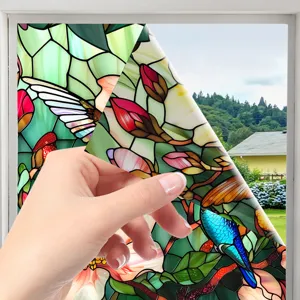 Decorative stained glass window film with hummingbird floral design for home privacy and sun protection.