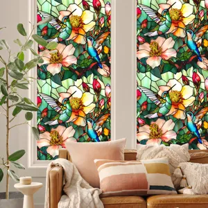 Stained glass window film with hummingbird and floral pattern for home privacy.