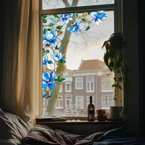 Stained glass window film with blue floral design for home privacy decoration and window styling.
