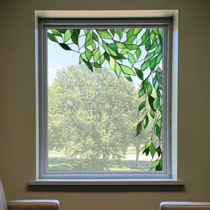Decorative static cling window film with green leaf stained glass design for privacy and home decor.