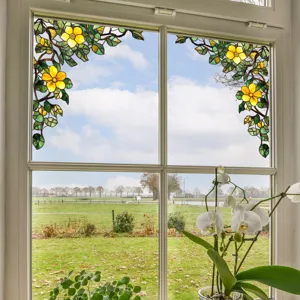 Detailed view of static stained glass window film featuring yellow floral design for home privacy.