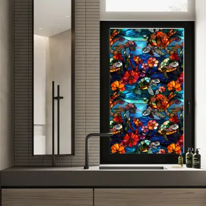 Stained glass window film with colorful sea turtle and floral art pattern for home decor.