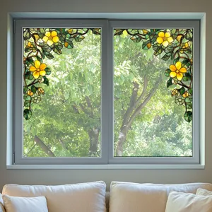 Stained glass window film with yellow flowers and green leaves pattern for home privacy decor.