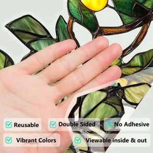 Stained glass window film detail showing static cling feature and vibrant leaf pattern.