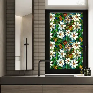 Stained glass window film detail showing vibrant floral pattern for bathroom privacy and decor.