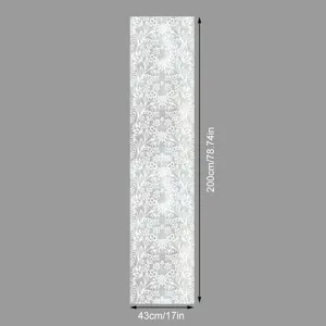 Detail view of the white lace static cling window film, showcasing exquisite floral decor.