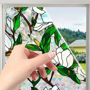 Decorative static cling window film with stained glass magnolia flower design for home.