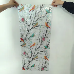 Colorful electrostatic glass window film with tree branches and cute birds pattern for home decor.