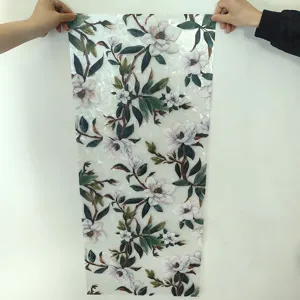 Magnolia floral window film detail shot, static decorative glass sticker for home decor.