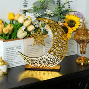 Golden acrylic moon star table ornament for Ramadan Eid festival home desktop decoration setup.