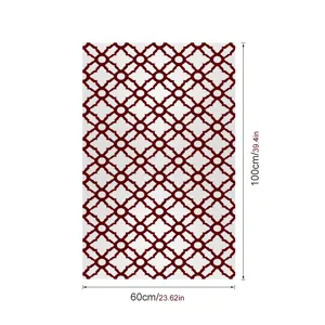 Gedetailleerd overzicht van geometrische glas-in-lood raamfolie met klassiek rood-wit patroon.