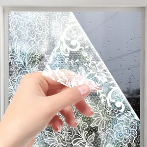 White lace window film detail close-up, static cling glass sticker for home window decor.