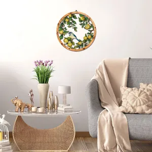 Wooden metal wall hanging decor with lemon branches and bird for home living room decoration detail.