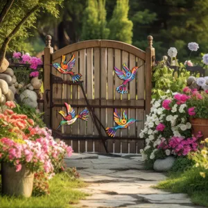 Colorful metal hummingbird wall art for outdoor garden fence decoration and yard hanging decor.