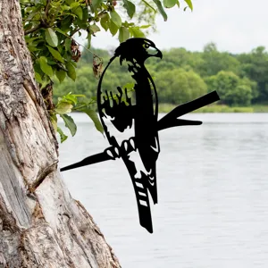 Metal hawk silhouette garden stake, black iron art tree decor for outdoor yard and lawn.
