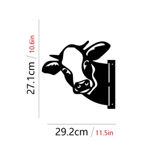 Metal cow head garden stake detail, black iron animal silhouette for outdoor yard decor use.