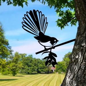 Metal garden bird silhouette tree stake decoration for outdoor yard and lawn landscaping art.
