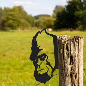 Metal Bigfoot silhouette garden stake, outdoor yard fence art decoration for trees.