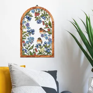 Detailed scene view of wooden arch wall hanging featuring elegant floral bird botanical art decor.