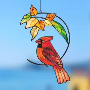 Stained glass red cardinal suncatcher detail, autumn leaves window hanging decor art piece.